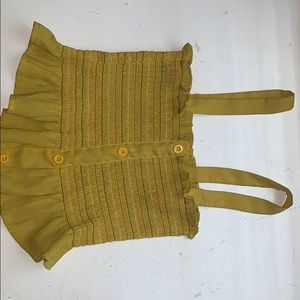 This pretty yellow crop top with straps